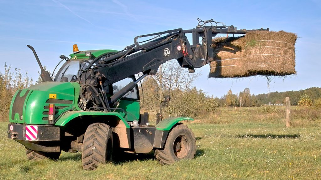 Погрузчик универсальный с телескопической стрелой Амкодор 527
